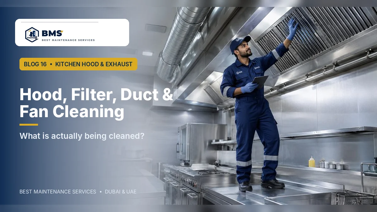 BMS technician inspecting kitchen hood filters duct and exhaust system in Dubai