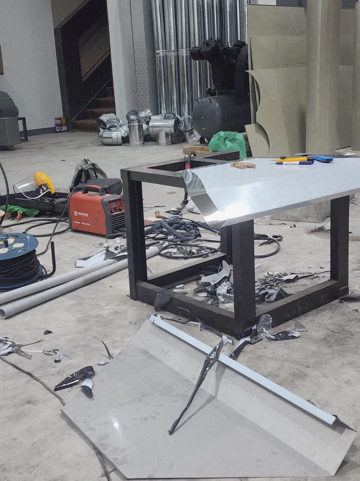 Commercial kitchen hood and duct assembly frame during fabrication Commercial kitchen hood and duct assembly frame during fabrication