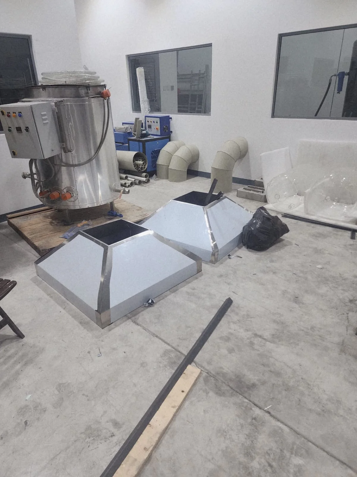 Commercial kitchen exhaust components prepared during BMS fabrication work Commercial kitchen exhaust components prepared during BMS fabrication work