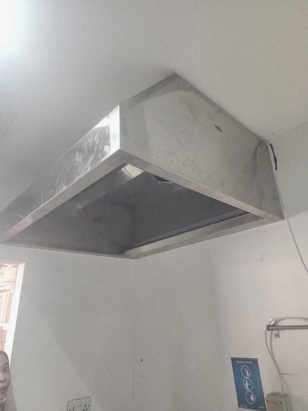 Installed stainless commercial kitchen extraction hood Installed stainless commercial kitchen extraction hood