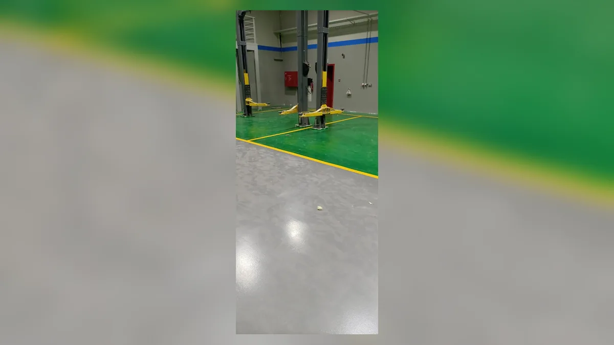 Real epoxy floor coating in a parking or utility area