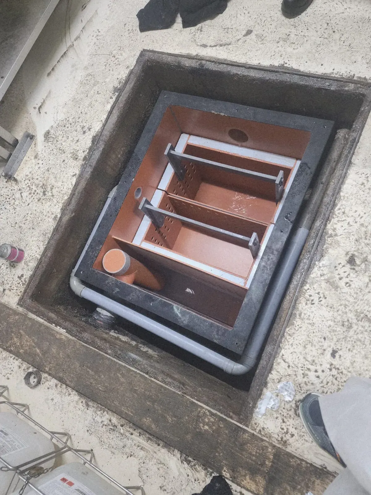 Completed internal grease trap chamber with baffles at Yaumi International Bakery in Dubai Investment Park