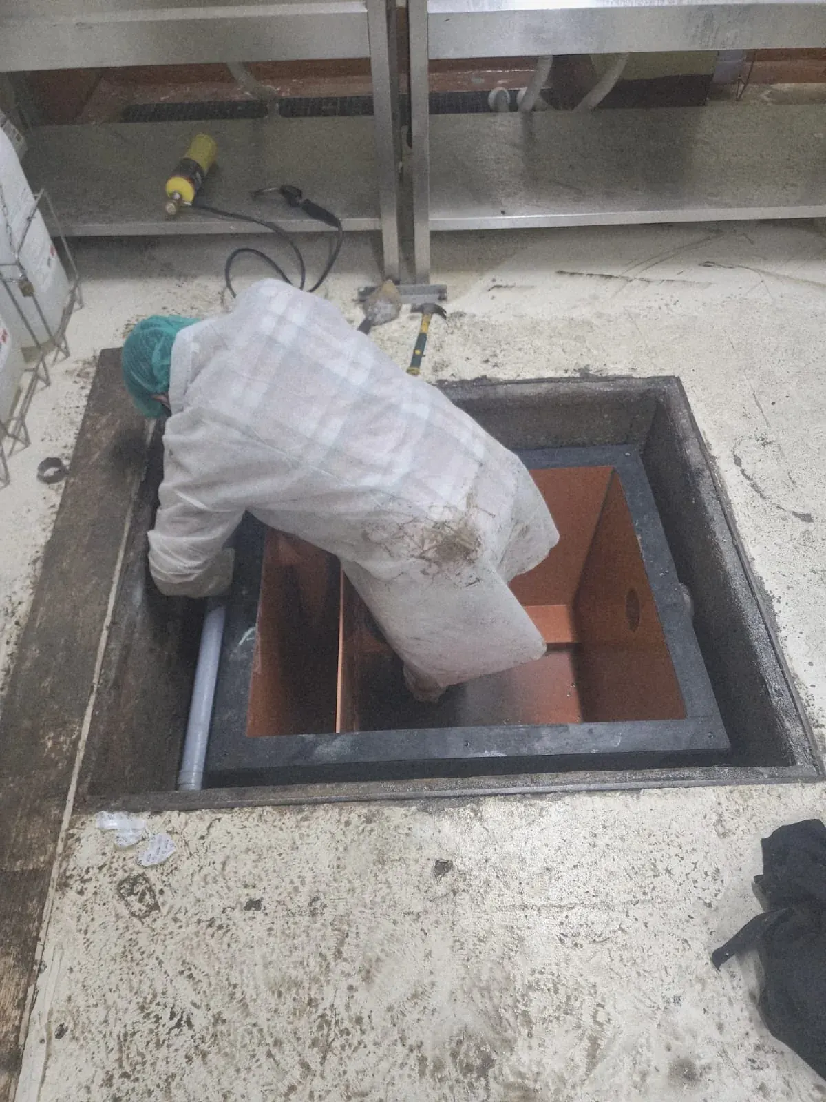 BMS installation work on a PVC grease trap for Yaumi International Bakery in DIP